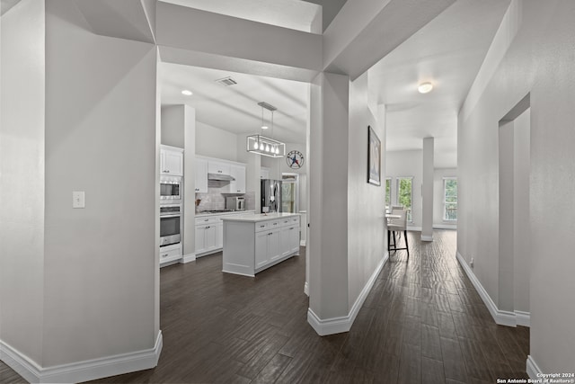 hallway featuring dark hardwood / wood-style floors