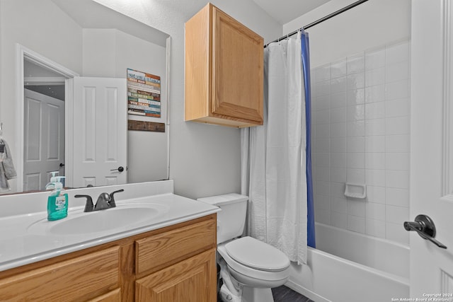 full bathroom featuring shower / tub combo with curtain, vanity, and toilet