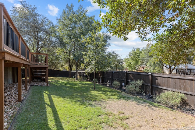 view of yard featuring a deck