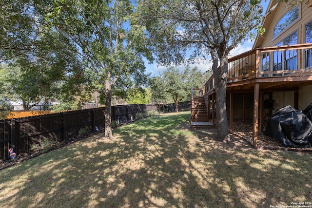 view of yard with a wooden deck