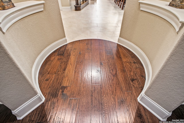 details with wood-type flooring