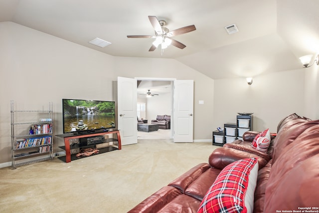 carpeted living room featuring lofted ceiling and ceiling fan