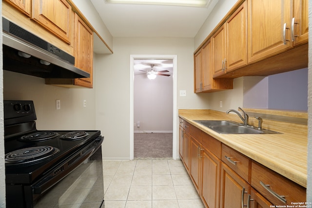 kitchen featuring range hood, light tile patterned floors, sink, electric range, and ceiling fan