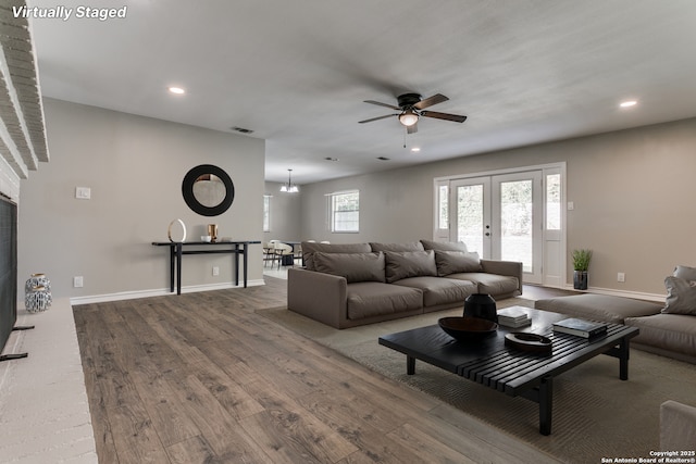 4103 Midvale Dr, San Antonio, TX 78229 - living area with a ceiling fan, wood finished floors, recessed lighting, baseboards, and french doors