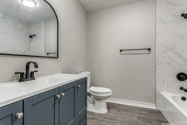 4103 Midvale Dr, San Antonio, TX 78229 - full bath with vanity, wood finished floors, toilet, shower / bathtub combination, and baseboards
