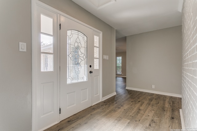 entrance foyer featuring dark hardwood / wood-style flooring