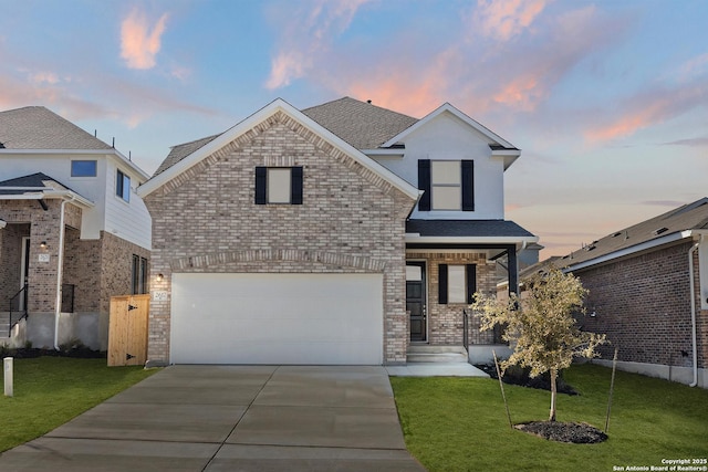 2617 White Willow, San Antonio, TX 78245 - traditional-style house featuring an attached garage, driveway, brick siding, and a yard