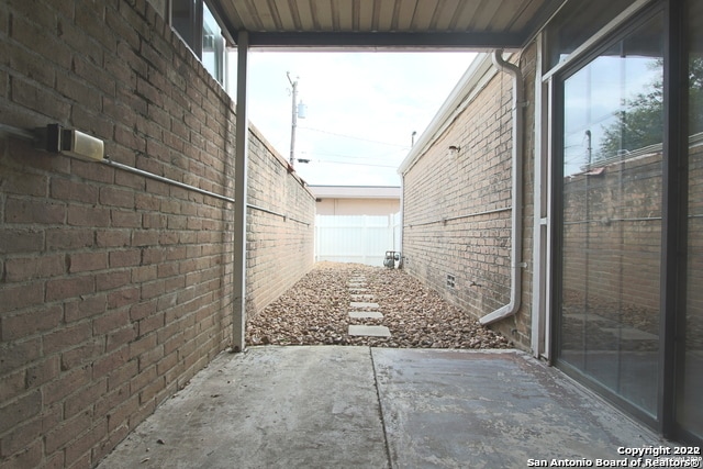 view of home's exterior with a patio