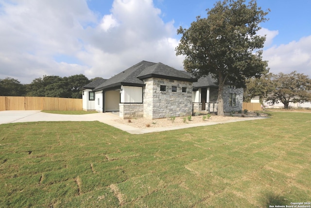 view of property exterior featuring a yard