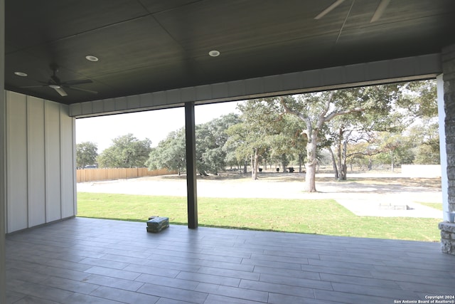 doorway to outside featuring hardwood / wood-style floors and ceiling fan