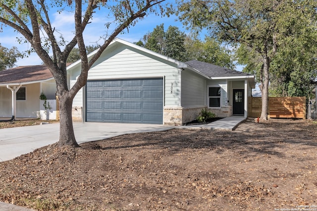 ranch-style home with a garage