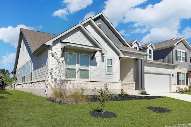11514 Hollering Pass, Schertz, TX 78154 - view of front of house with board and batten siding, a garage, and a front yard