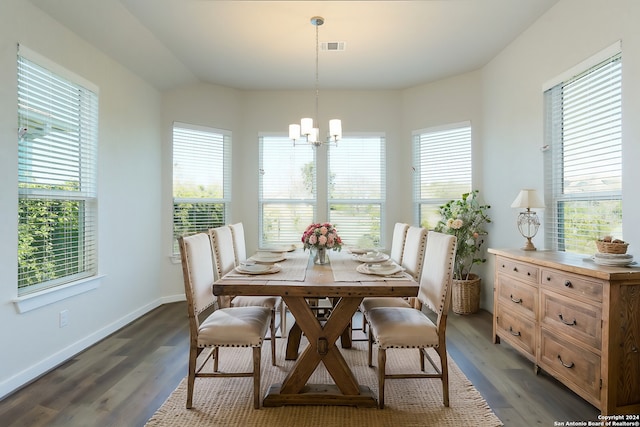 11514 Hollering Pass, Schertz, TX 78154 - dining area with a chandelier, plenty of natural light, dark wood finished floors, and baseboards