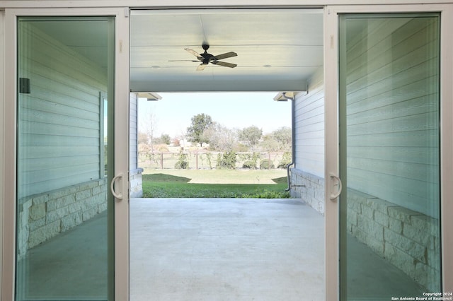 11514 Hollering Pass, Schertz, TX 78154 - doorway to outside with concrete floors and a ceiling fan