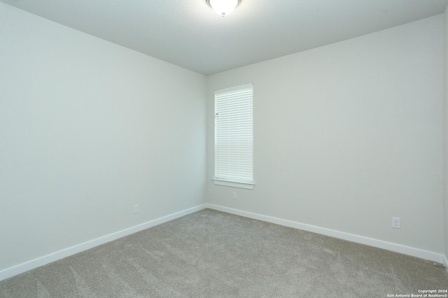 11514 Hollering Pass, Schertz, TX 78154 - empty room featuring carpet floors and baseboards