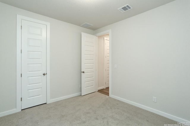 11514 Hollering Pass, Schertz, TX 78154 - unfurnished bedroom featuring carpet and baseboards