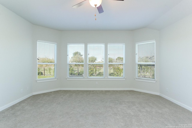11514 Hollering Pass, Schertz, TX 78154 - empty room featuring plenty of natural light, carpet floors, and a ceiling fan