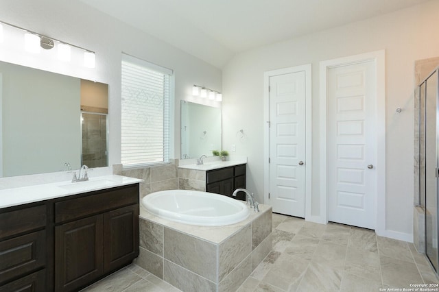 11514 Hollering Pass, Schertz, TX 78154 - bathroom with a stall shower, a garden tub, and two vanities