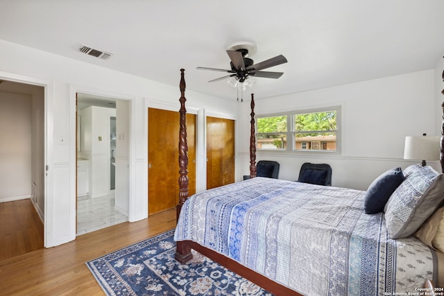 bedroom with wood-type flooring and ceiling fan