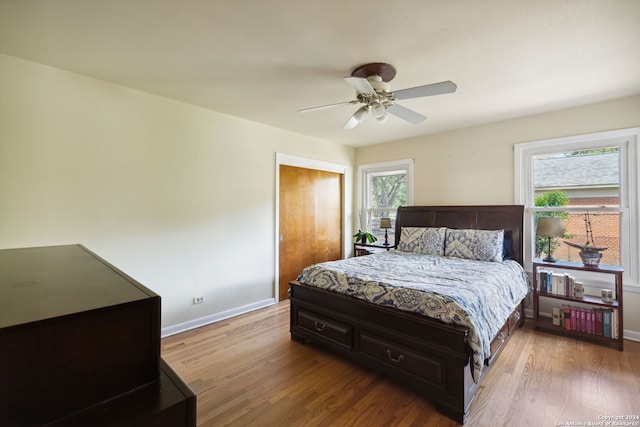 bedroom featuring hardwood / wood-style floors and ceiling fan