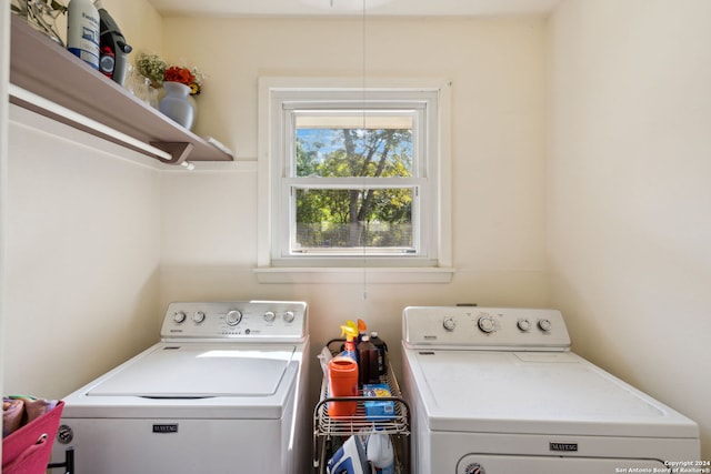 laundry area with independent washer and dryer