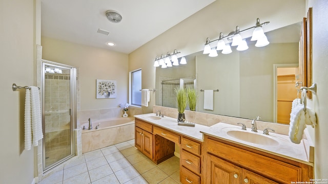 bathroom with vanity, tile patterned floors, and separate shower and tub