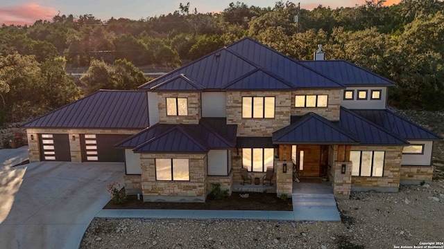 modern inspired farmhouse featuring covered porch