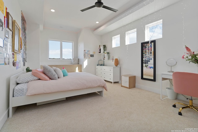 bedroom featuring light carpet and ceiling fan