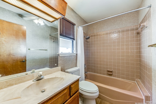 full bathroom with shower / bath combo with shower curtain, vanity, and toilet