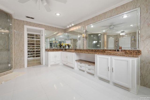 bathroom with ornamental molding, an enclosed shower, vanity, and ceiling fan