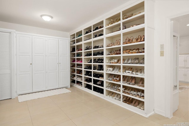 2301 Tanglewood, Weslaco, TX 78596 - walk in closet featuring light tile patterned flooring