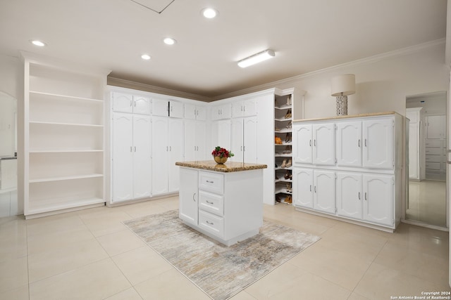 spacious closet featuring light tile patterned floors