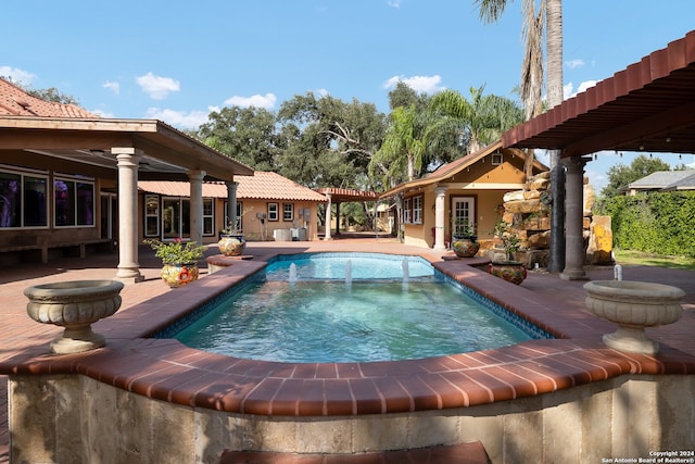 view of swimming pool featuring a patio