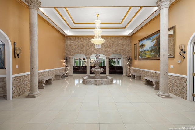 2301 Tanglewood, Weslaco, TX 78596 - lobby featuring ornamental molding, wainscoting, and a towering ceiling