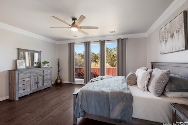 bedroom with dark wood-type flooring, ceiling fan, and crown molding