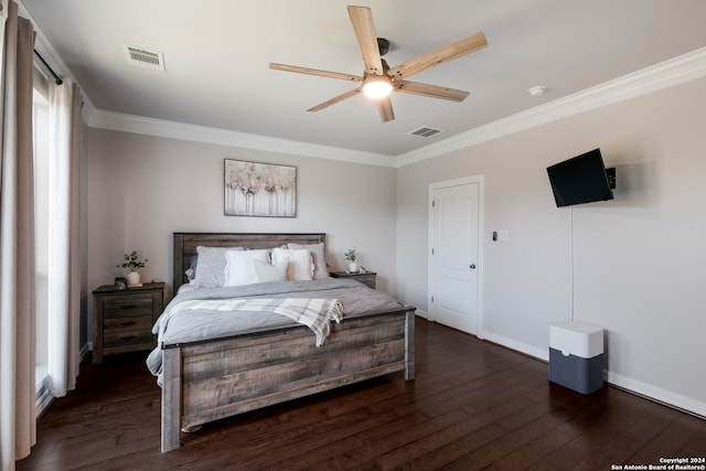 bedroom with dark wood-type flooring, ornamental molding, multiple windows, and ceiling fan