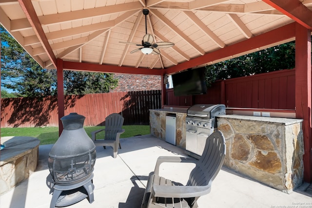 view of patio / terrace with ceiling fan, area for grilling, a gazebo, and grilling area