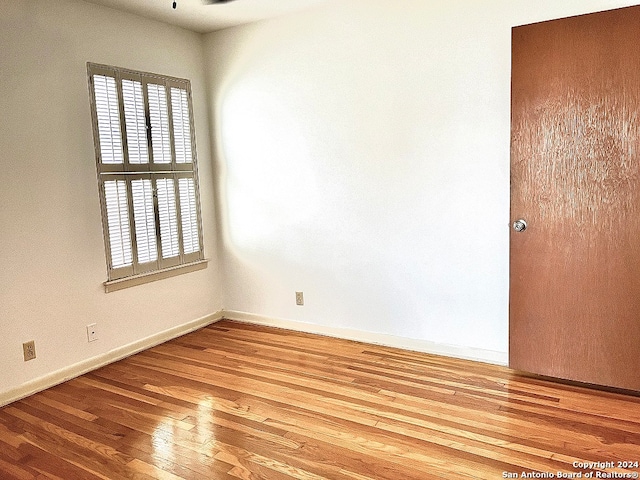 spare room featuring light wood-type flooring