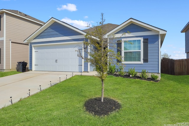 ranch-style house with a front lawn and a garage