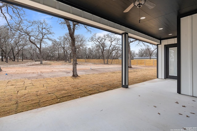 view of patio featuring ceiling fan