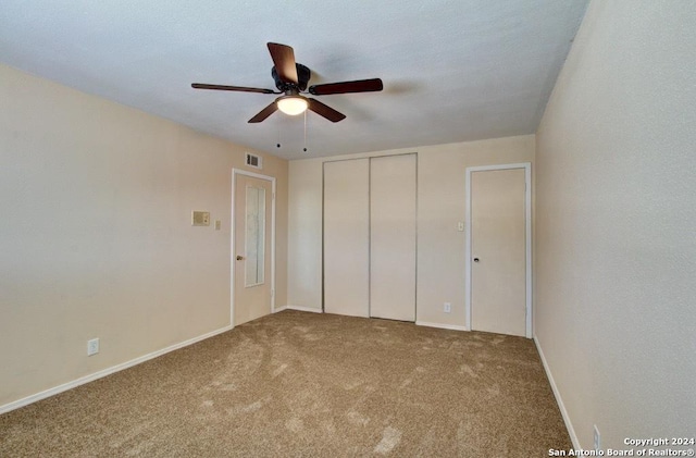 6810 Crown Rdg, San Antonio, TX 78239 - unfurnished bedroom with carpet floors, a closet, ceiling fan, and baseboards