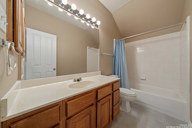 full bathroom featuring vanity, vaulted ceiling, shower / bathtub combination with curtain, tile patterned flooring, and toilet