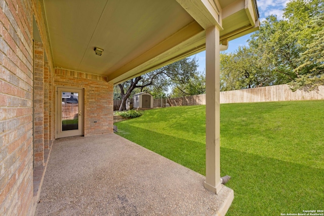 view of patio featuring a storage unit