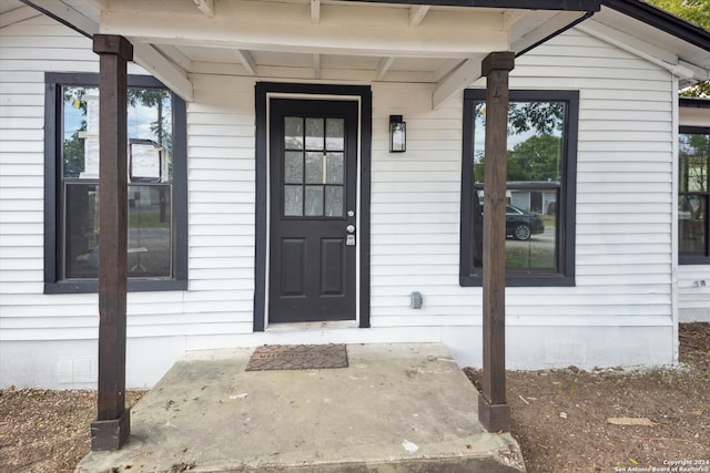 property entrance with a porch