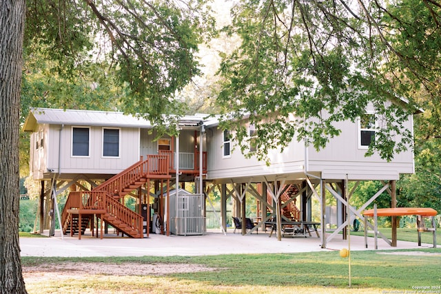 view of play area with a yard