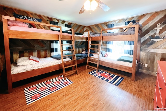 bedroom featuring hardwood / wood-style flooring and ceiling fan