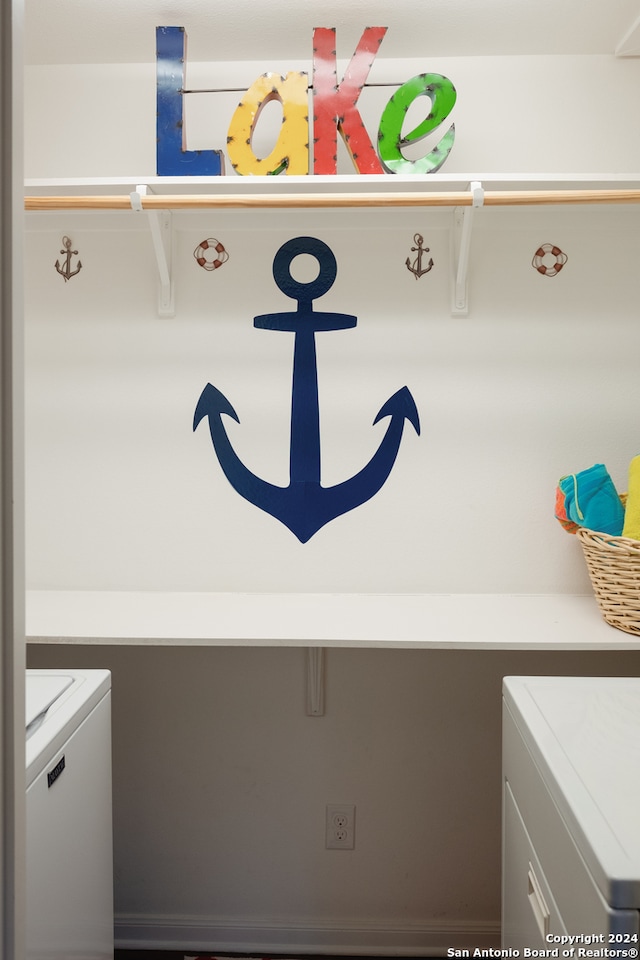 room details featuring washing machine and dryer