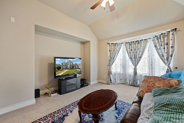 living room featuring carpet, vaulted ceiling, and ceiling fan