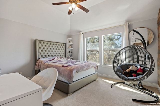 carpeted bedroom featuring ceiling fan and lofted ceiling