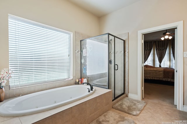 bathroom with independent shower and bath, ceiling fan, tile patterned flooring, and a healthy amount of sunlight